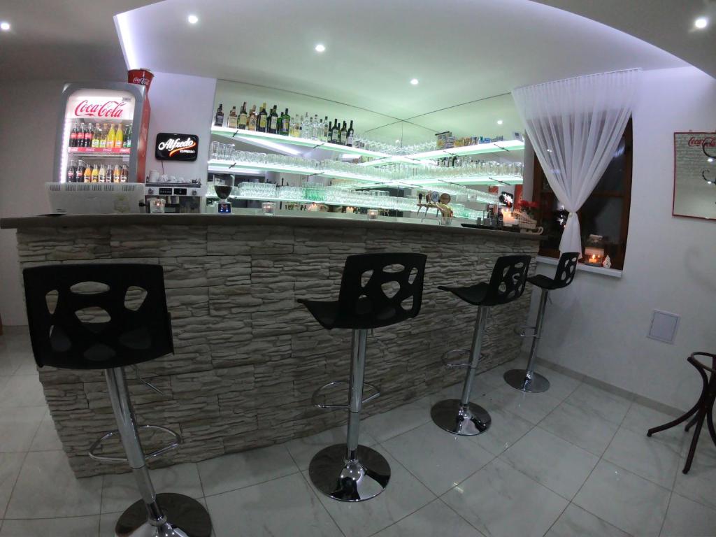 Lounge nebo bar v ubytování Pizzéria Viktória