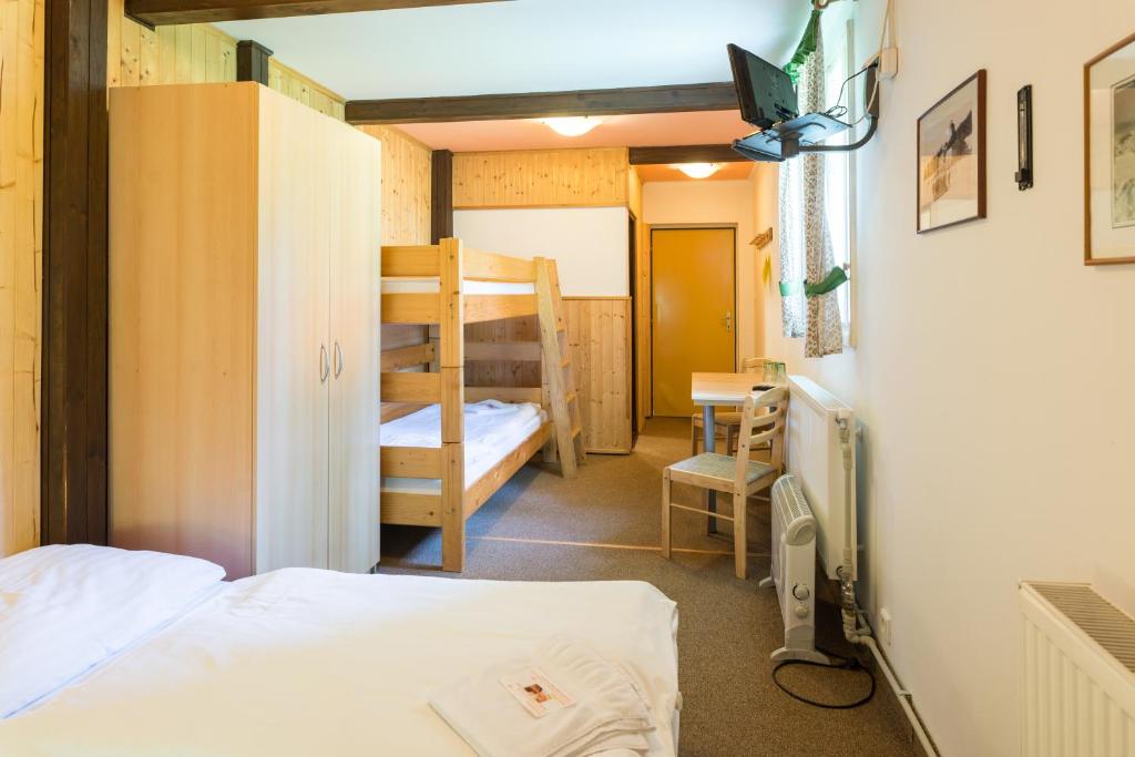 Postel nebo postele na pokoji v ubytování Hotel Diana