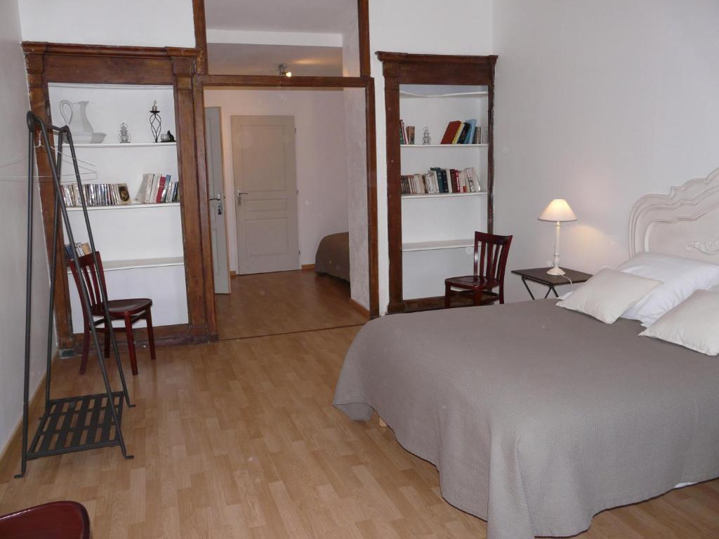 Postel nebo postele na pokoji v ubytování Hôtel Le Globe
