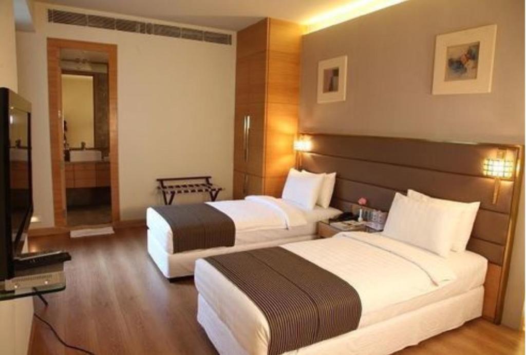 Postel nebo postele na pokoji v ubytování Middleton Inn