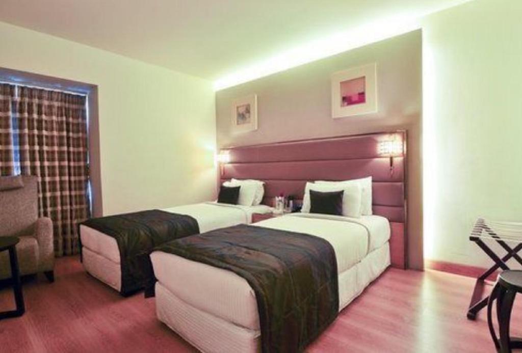 Postel nebo postele na pokoji v ubytování Middleton Inn