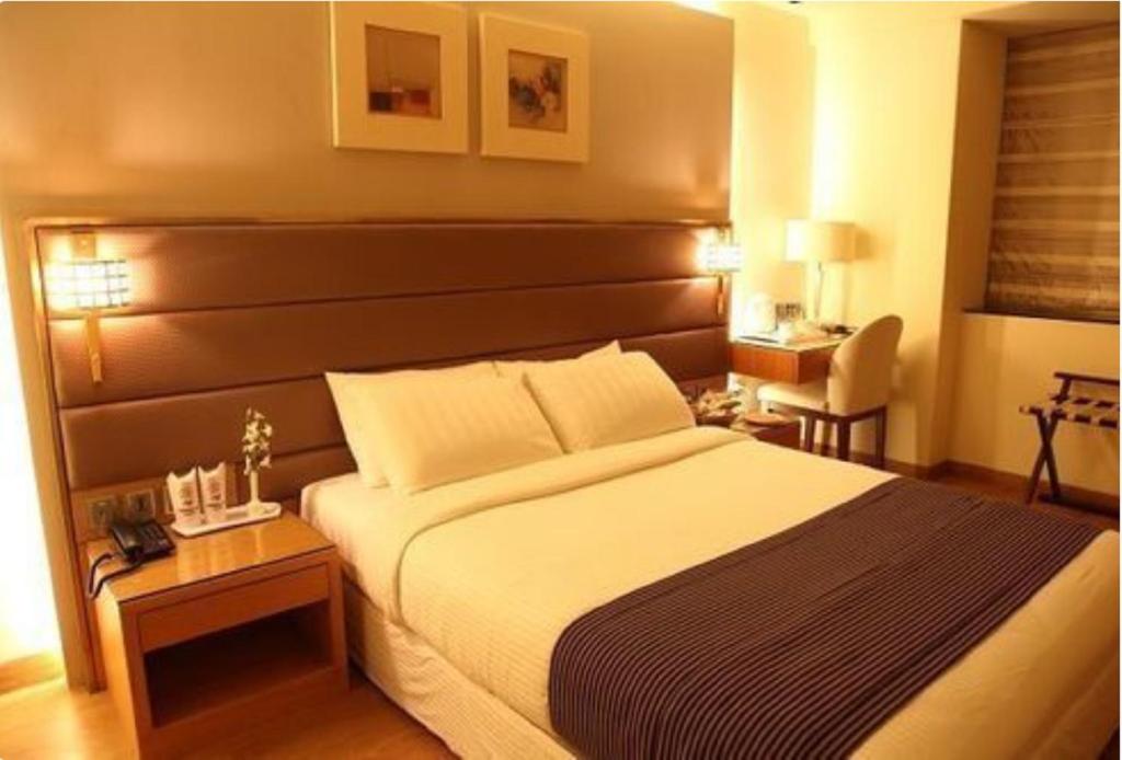 Postel nebo postele na pokoji v ubytování Middleton Inn