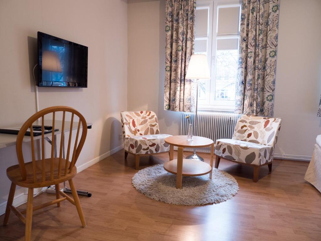 Posezení v ubytování Hotel Åberg Centralhotellet
