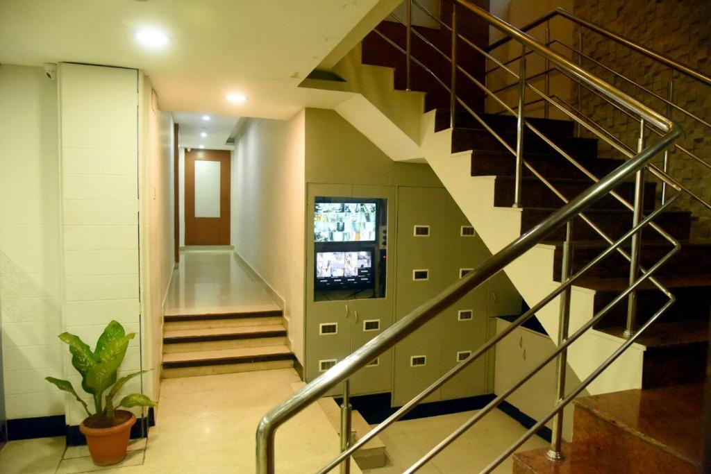 TV a/nebo společenská místnost v ubytování Hotel Pearl International