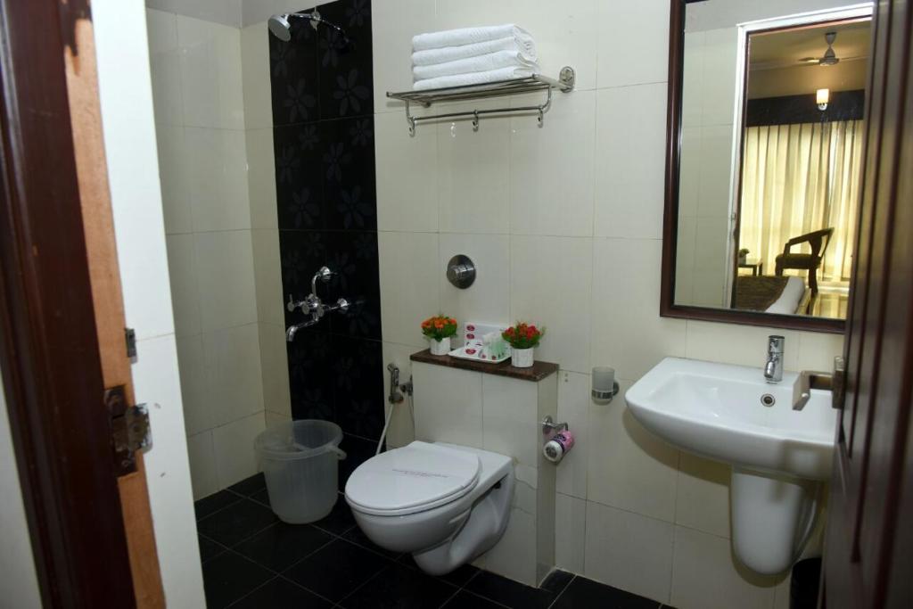 Koupelna v ubytování Hotel Pearl International