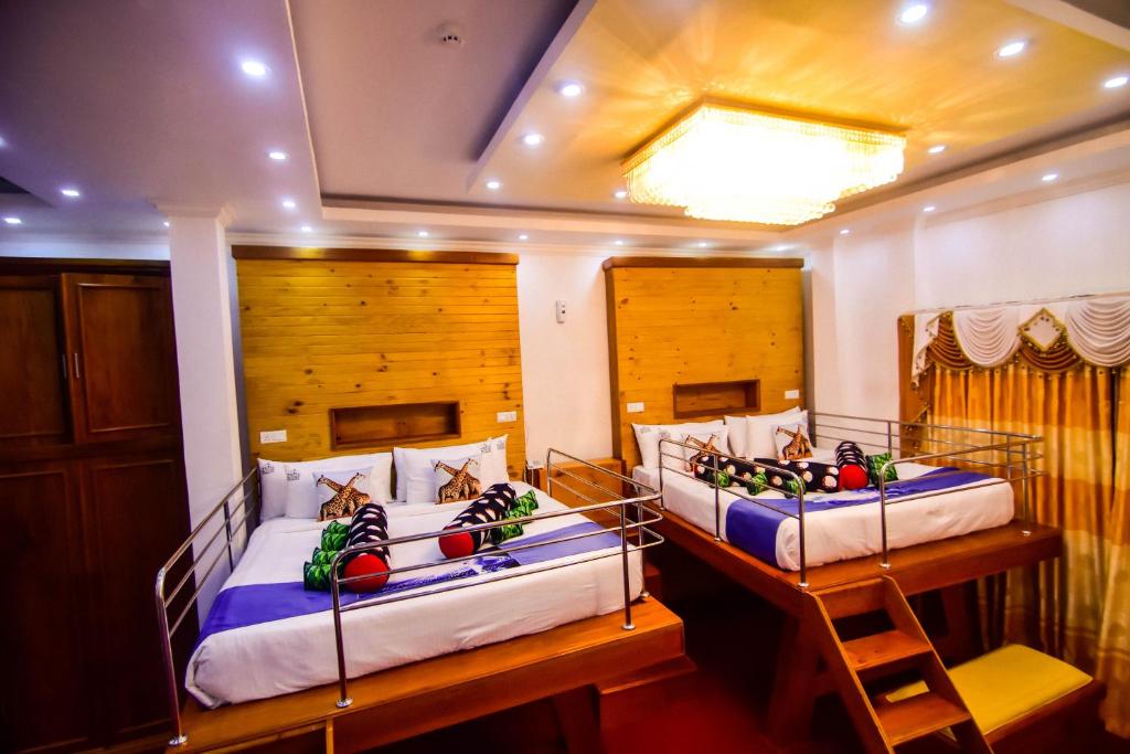 Postel nebo postele na pokoji v ubytování Hotel White House