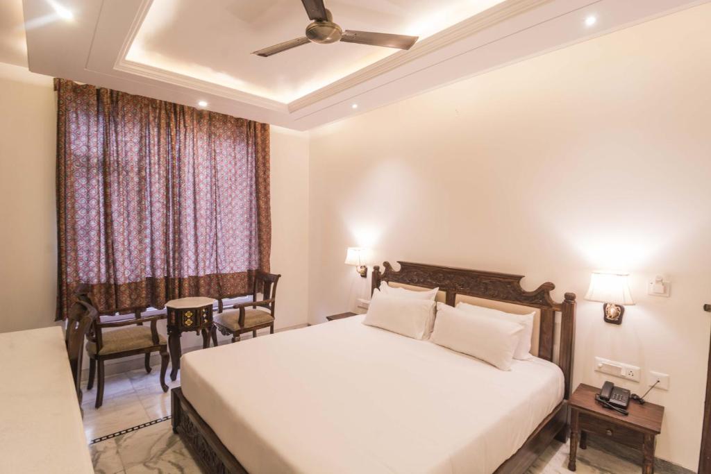 Cama o camas de una habitación en Pandya Niwas