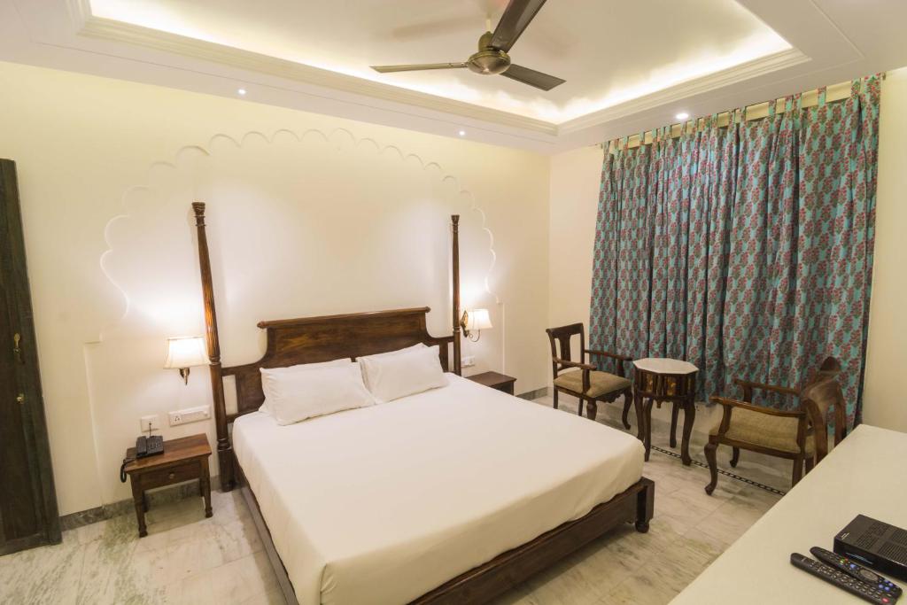 Cama o camas de una habitación en Pandya Niwas