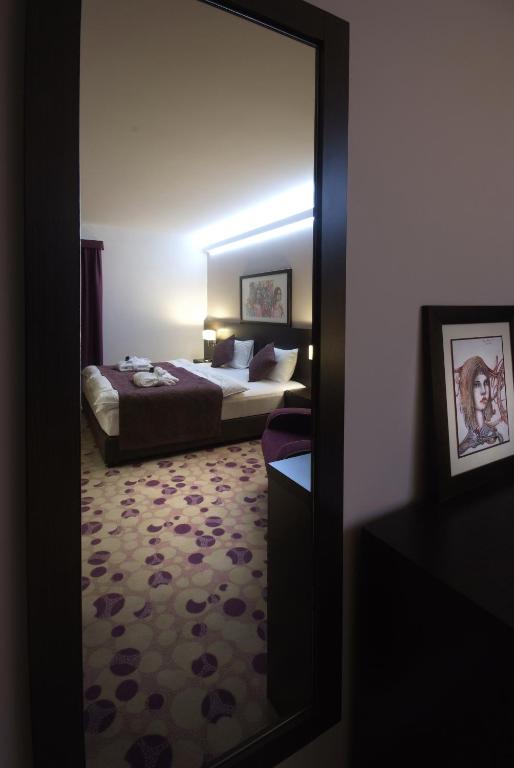 Postel nebo postele na pokoji v ubytování Hotel Park Doboj