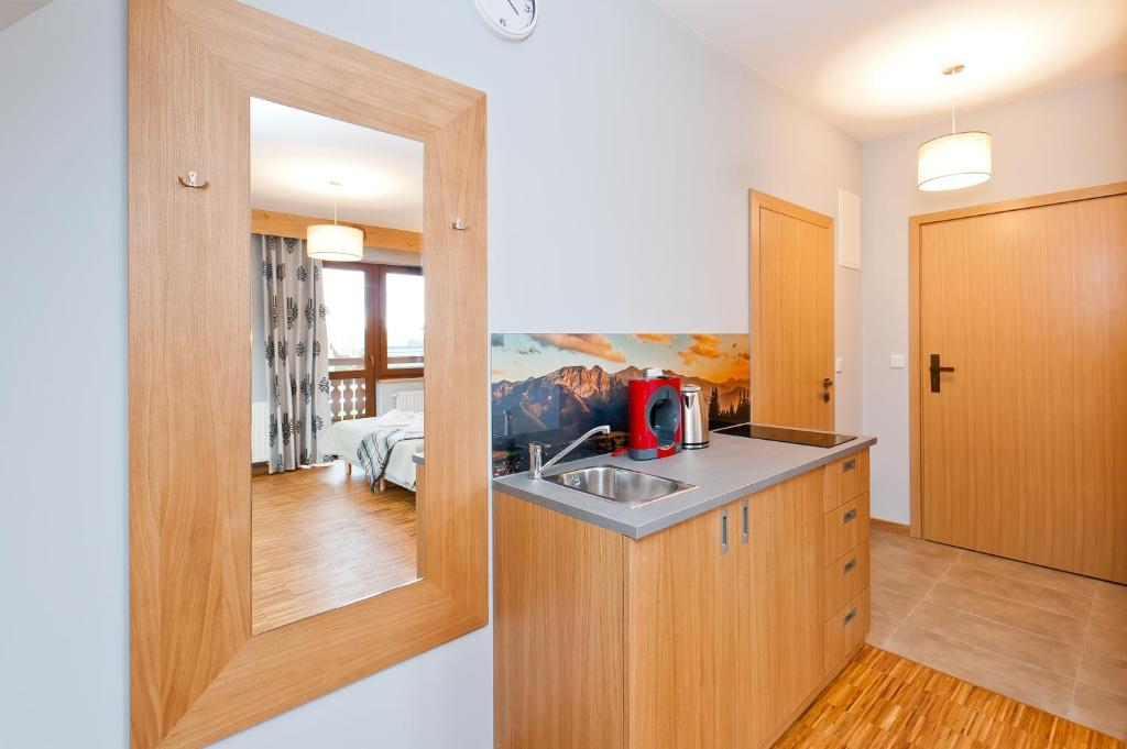 Apartamenty Sun & Snow Resorts Lipki Park z sauną - Studio Apartment