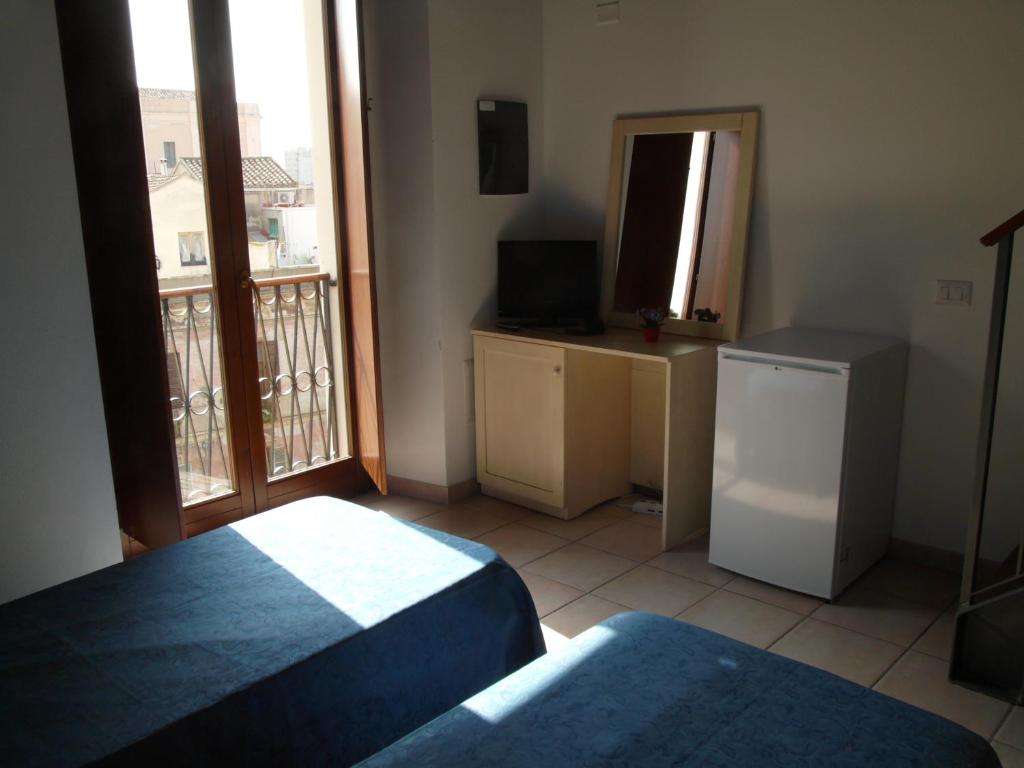 Postel nebo postele na pokoji v ubytování Hostel Marina
