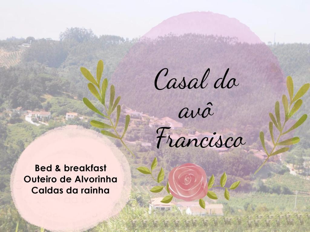 a picture of a flower with a mountain in the background at Casal do Avô Francisco in Caldas da Rainha