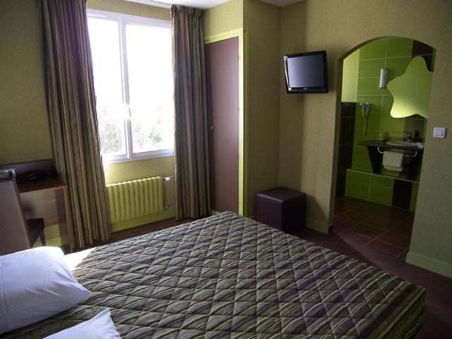 Postel nebo postele na pokoji v ubytování Le Montloire