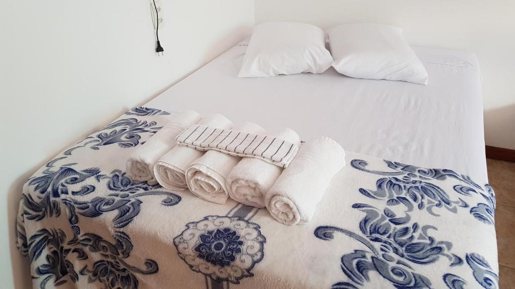 Postel nebo postele na pokoji v ubytování Hospedagens São Borja RS