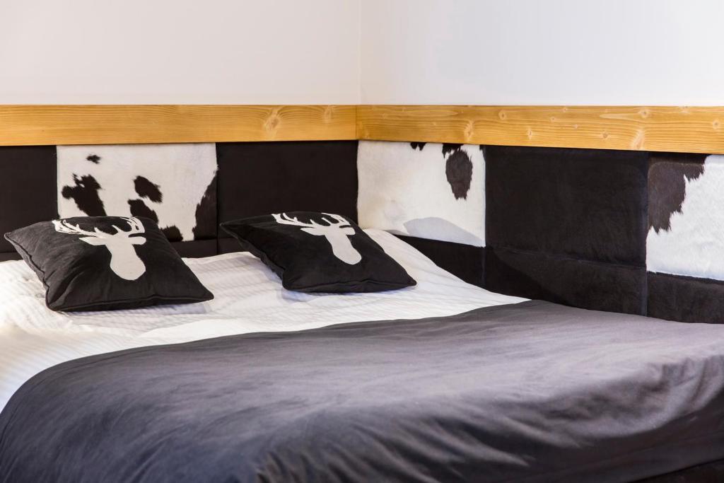 Posteľ alebo postele v izbe v ubytovaní Apartament Czarny Staw