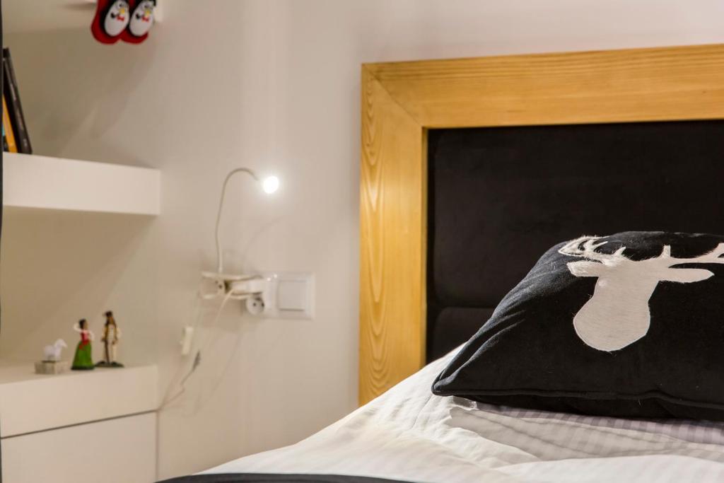Posteľ alebo postele v izbe v ubytovaní Apartament Czarny Staw