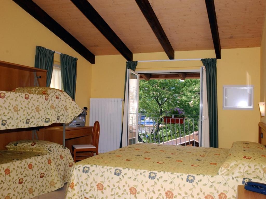 Postel nebo postele na pokoji v ubytování Hotel Agata