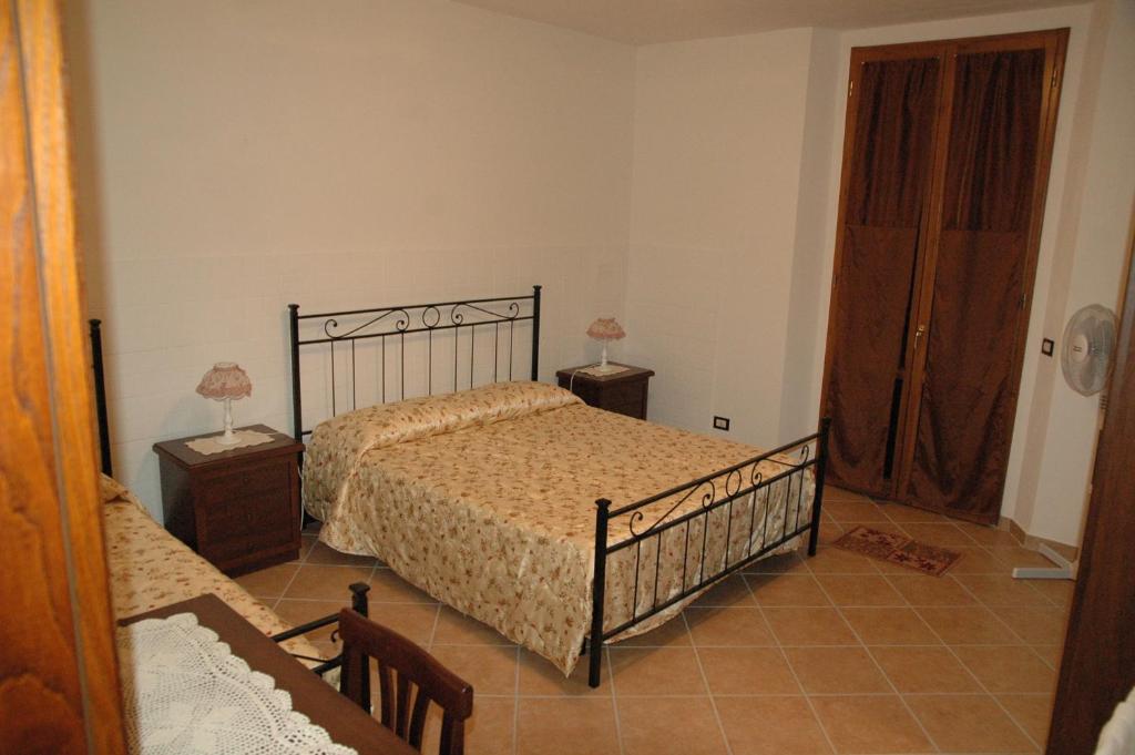 Letto o letti in una camera di Affittacamere La Sosta