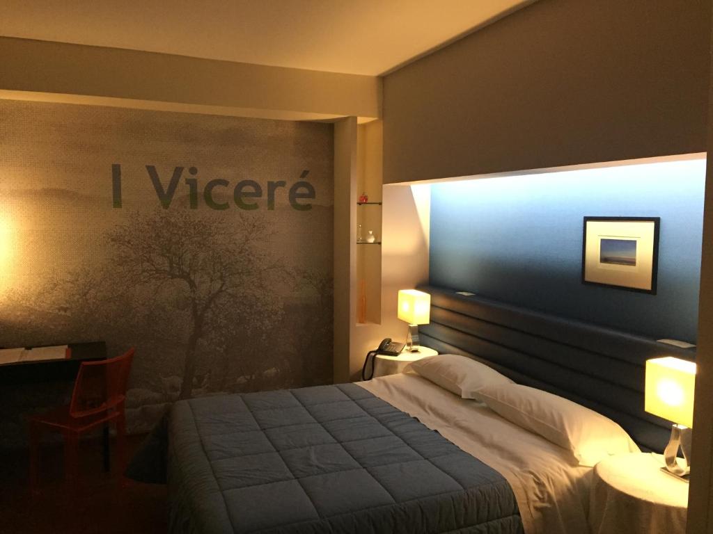 Postel nebo postele na pokoji v ubytování Mare Nostrum Petit Hôtel