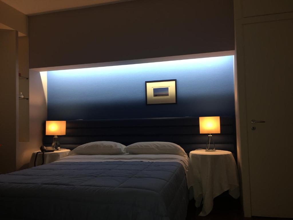 Postel nebo postele na pokoji v ubytování Mare Nostrum Petit Hôtel