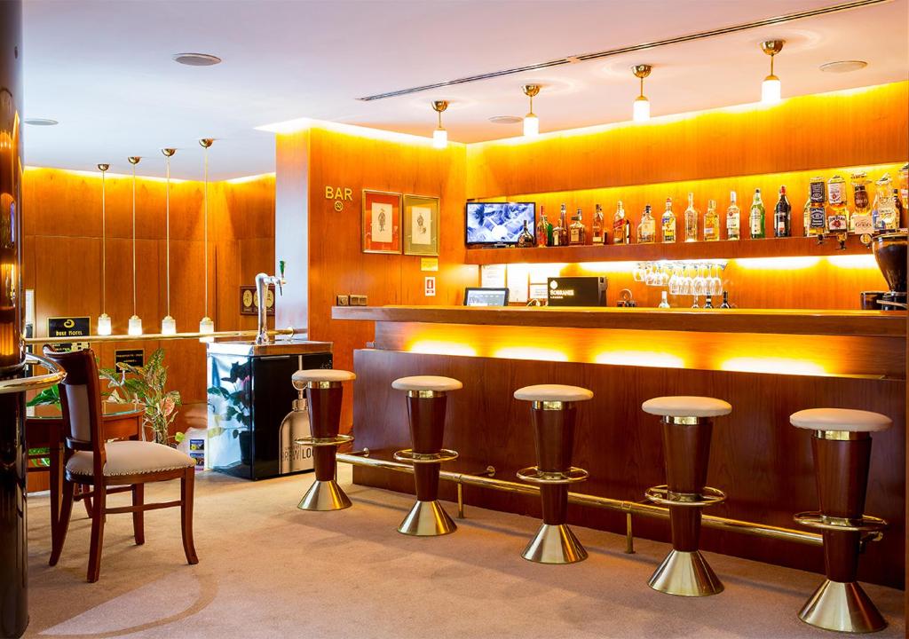 Lounge nebo bar v ubytování Hotel Duke Romana City Center