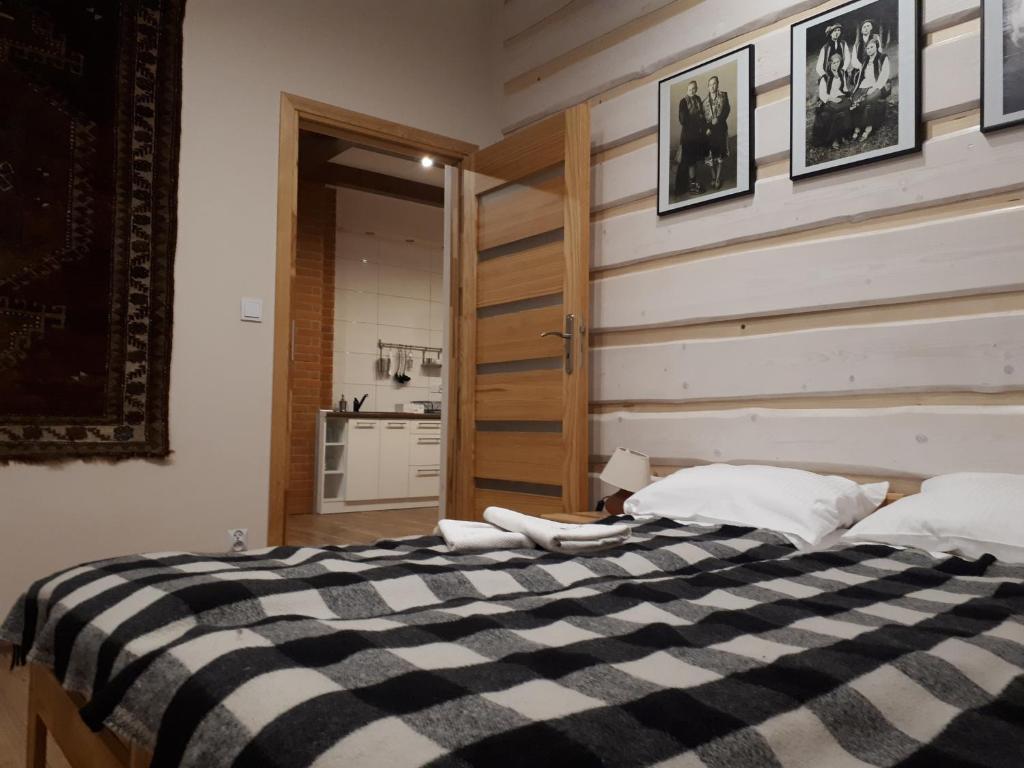 Posteľ alebo postele v izbe v ubytovaní Apartamenty "Maryna House" Zakopane