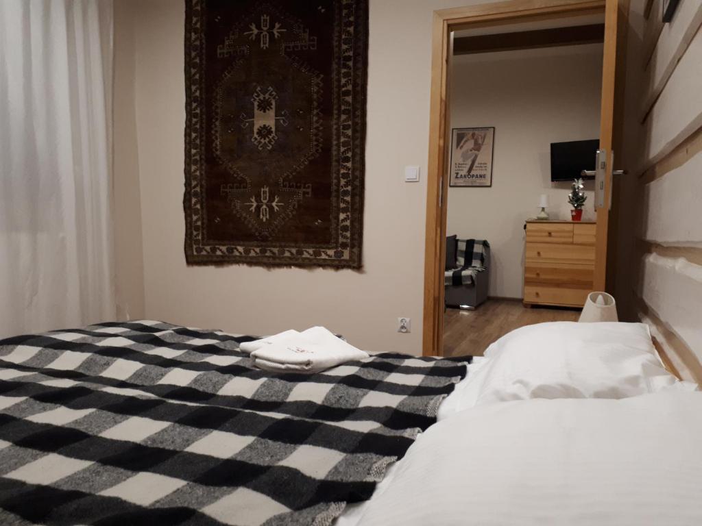 Posteľ alebo postele v izbe v ubytovaní Apartamenty "Maryna House" Zakopane