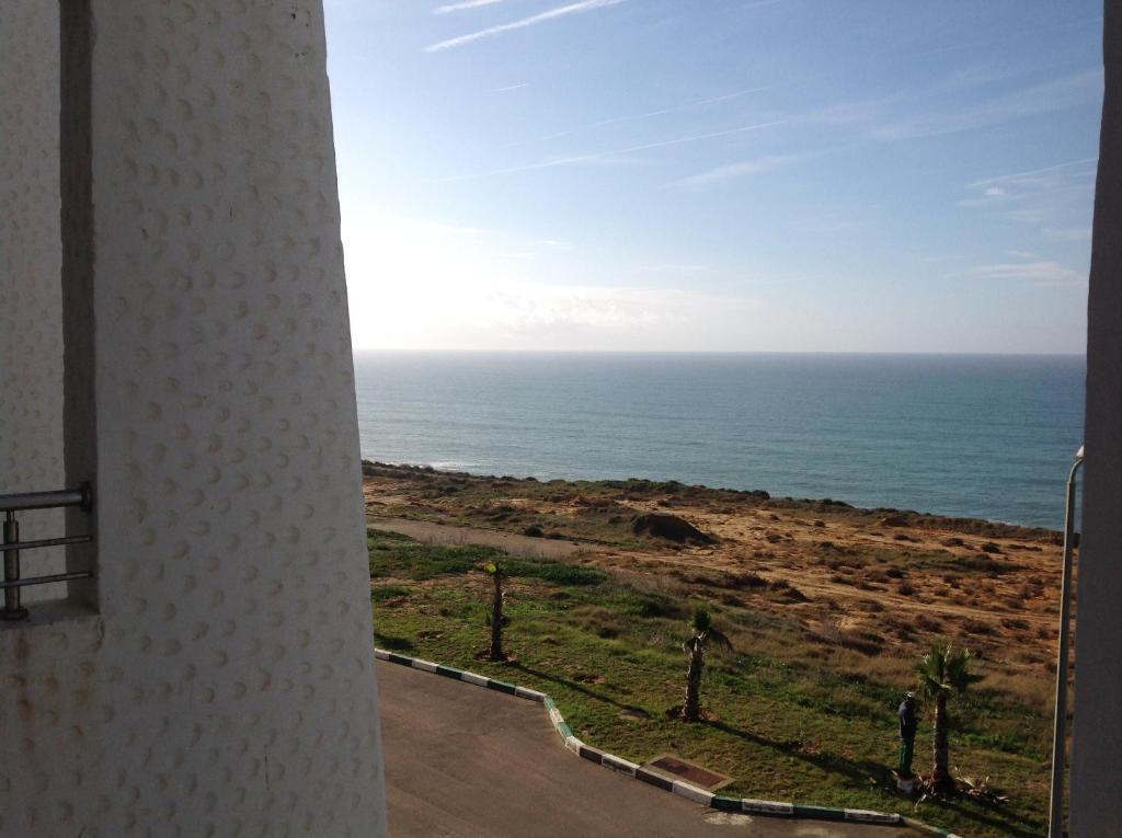 a view of the ocean from a building at SeaView Appart Chez Hicham in Asilah