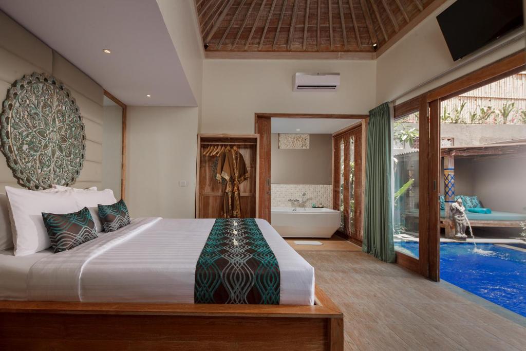 Postel nebo postele na pokoji v ubytování Mahagiri Resort Nusa Lembongan