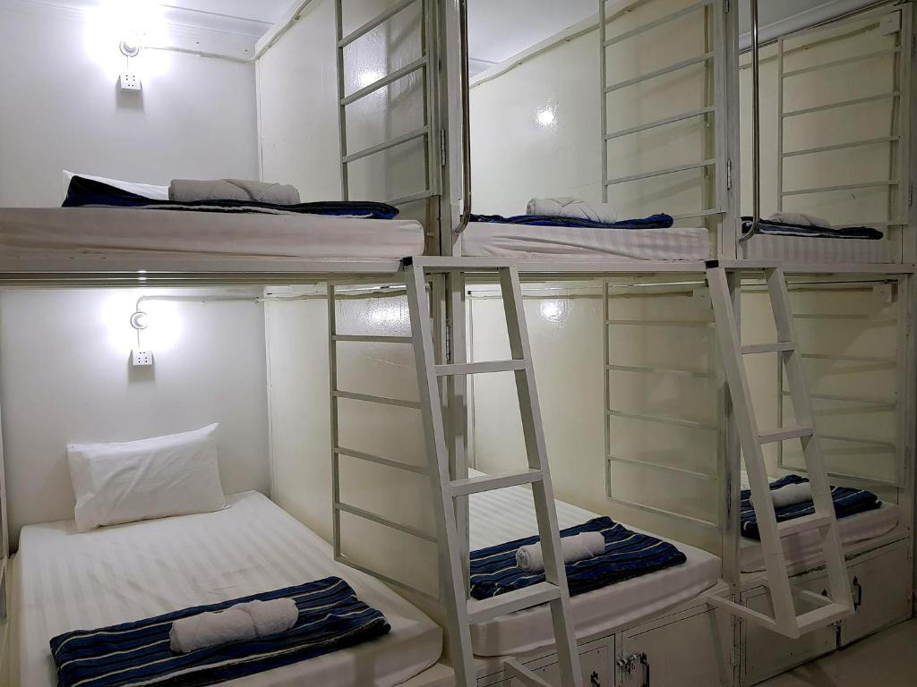 Postel nebo postele na pokoji v ubytování Lucky Hostel