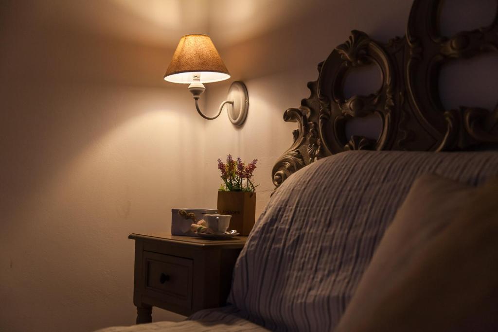 Postel nebo postele na pokoji v ubytování palazzinApulia