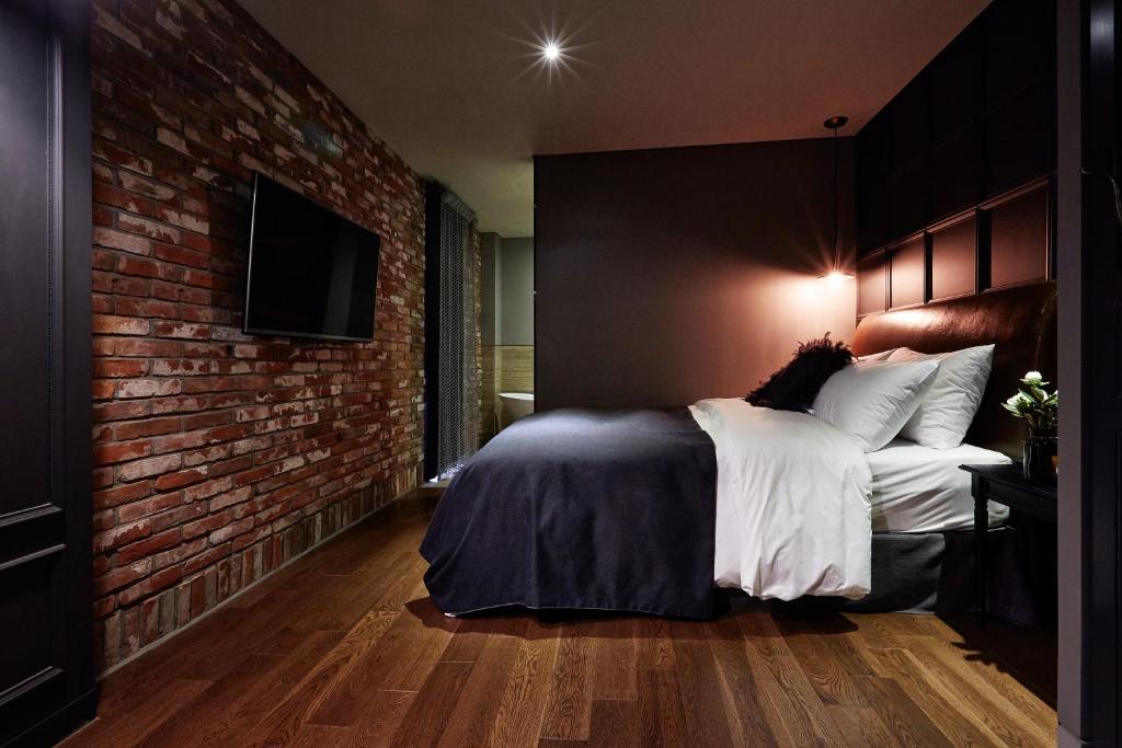Postel nebo postele na pokoji v ubytování Roseto Hotel