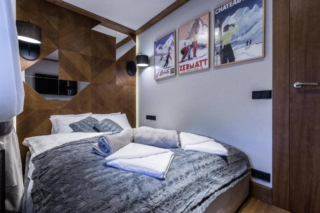 Posteľ alebo postele v izbe v ubytovaní Apartament Szymaszkowa Relax Ski Odkryj Zakopane