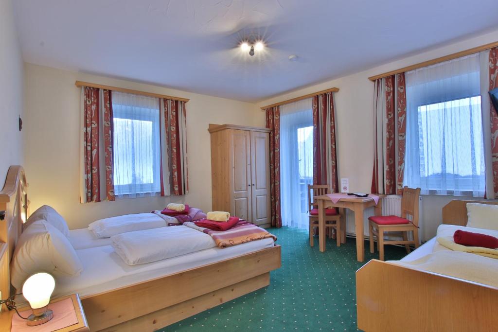 Postel nebo postele na pokoji v ubytování Hotel Beim Winkler