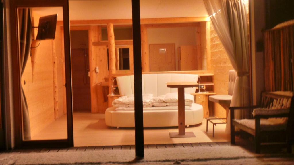 Postel nebo postele na pokoji v ubytování Albergo Gasthof zur Krone