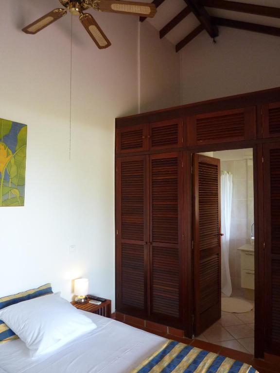 Postel nebo postele na pokoji v ubytování Chambre d'hotes "Villa Rayon Vert"