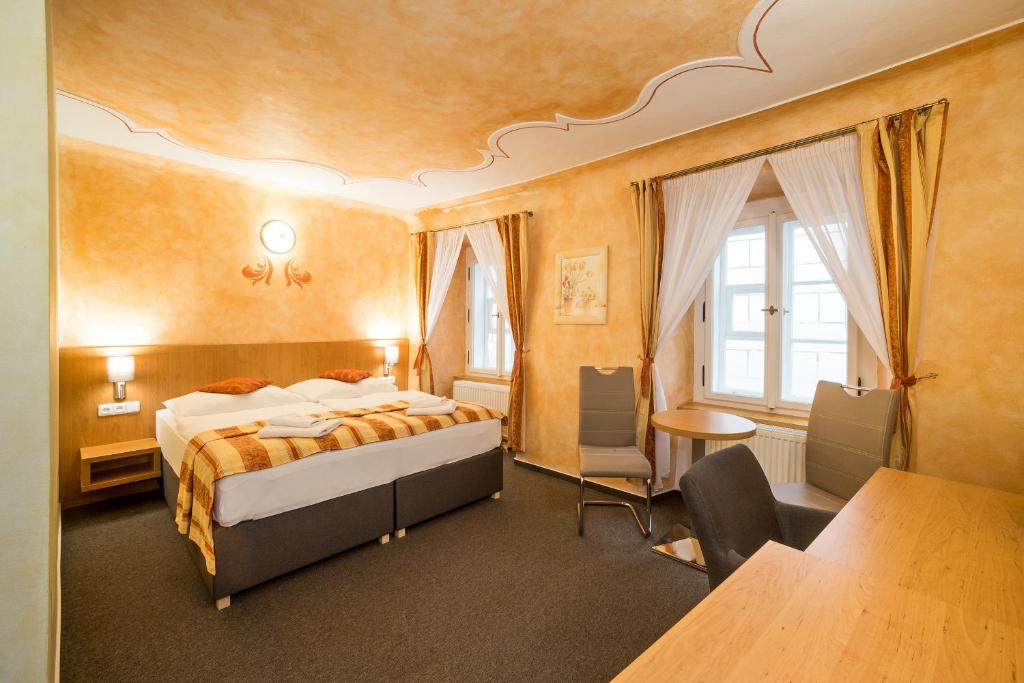 Łóżko lub łóżka w pokoju w obiekcie Pension Galko