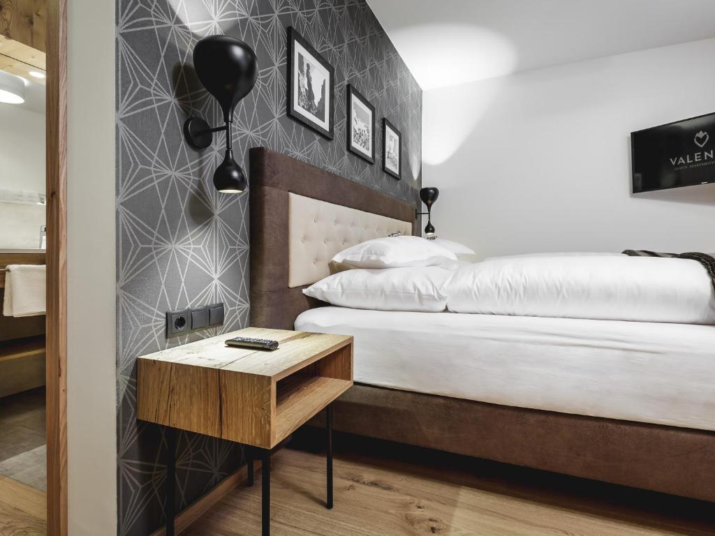 Posteľ alebo postele v izbe v ubytovaní Valentin Design Apartments