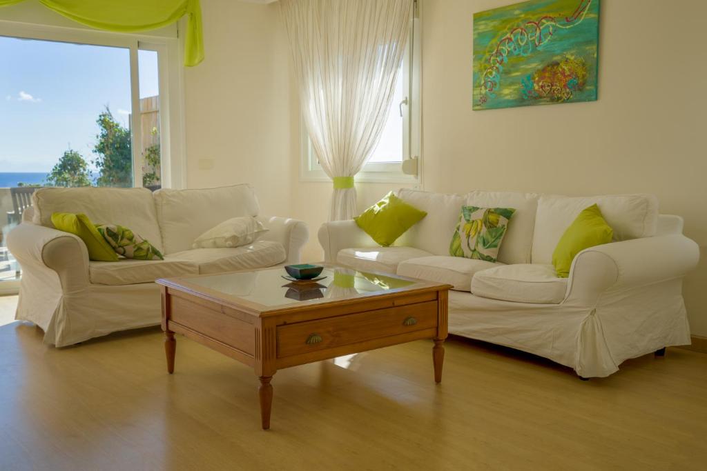 Posezení v ubytování Piso Paraiso La Nea