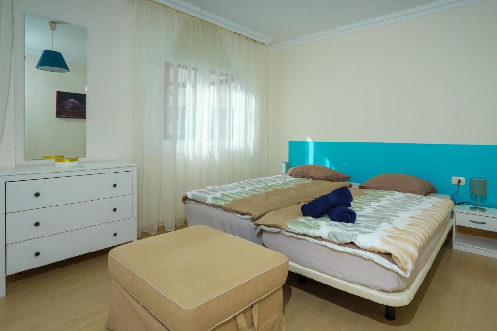 Postel nebo postele na pokoji v ubytování Piso Paraiso La Nea
