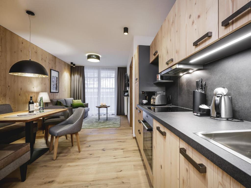 Kuchyňa alebo kuchynka v ubytovaní Valentin Design Apartments
