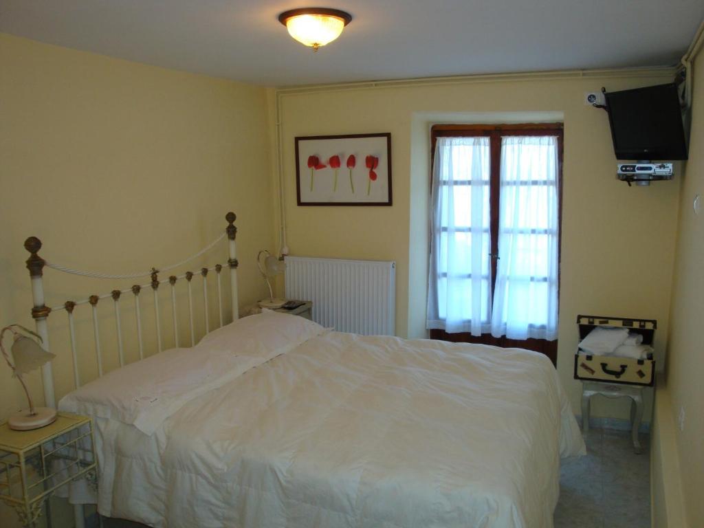 Posteľ alebo postele v izbe v ubytovaní Guesthouse Kleopatra's