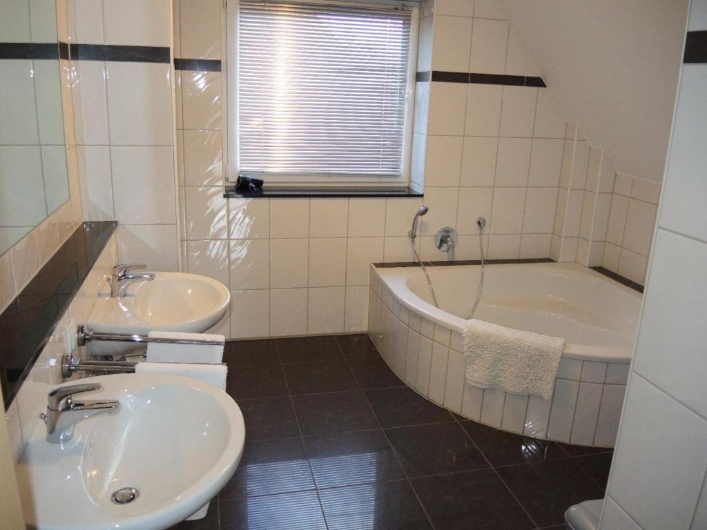 Koupelna v ubytování Usedom Bike Hotel & Suites