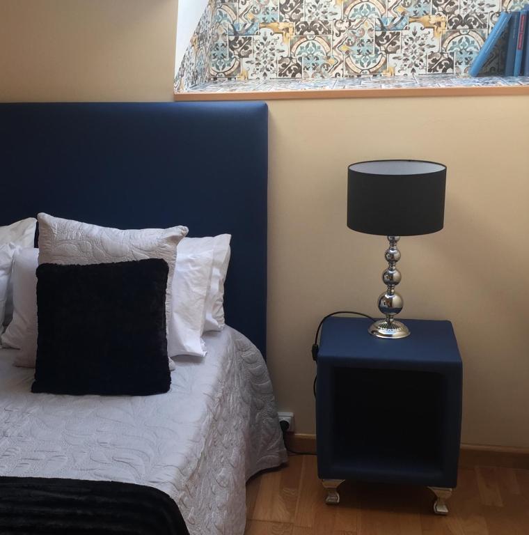 Posteľ alebo postele v izbe v ubytovaní Apartamento Conde Luna