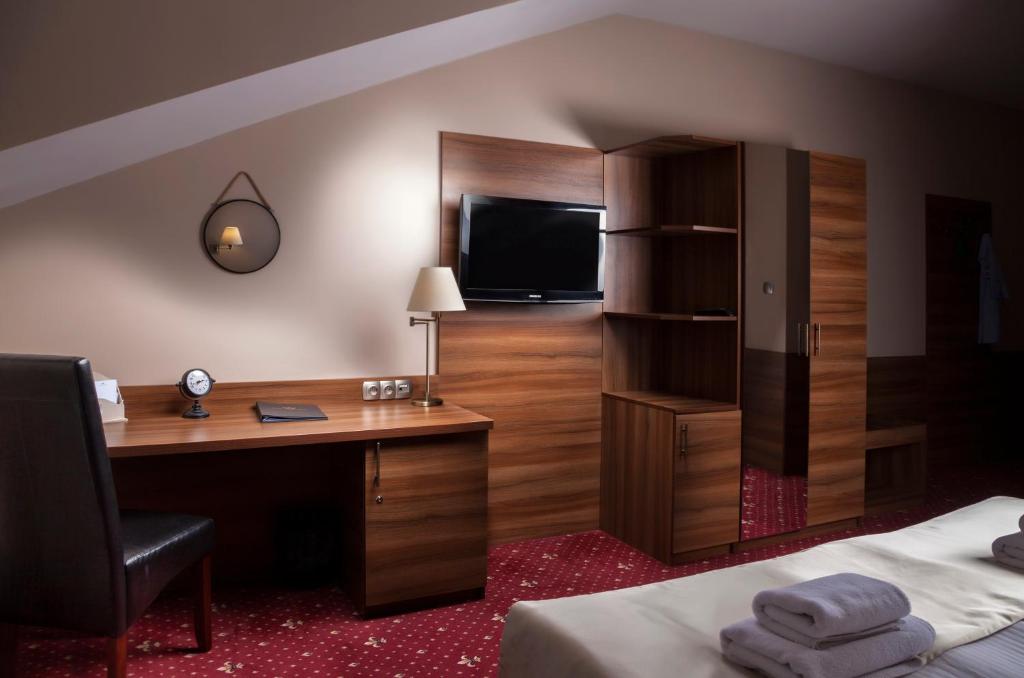 Posteľ alebo postele v izbe v ubytovaní Hotel Cristal Park
