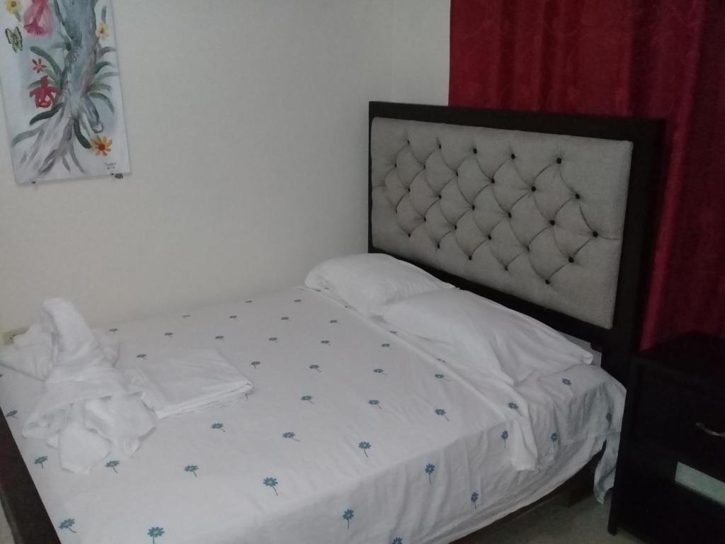 Postel nebo postele na pokoji v ubytování Hostel Quintonido