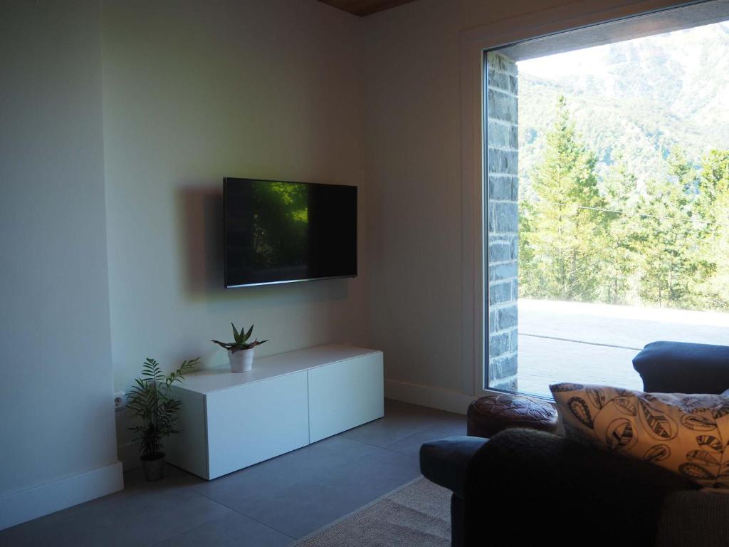 TV a/nebo společenská místnost v ubytování Apartamento Atari