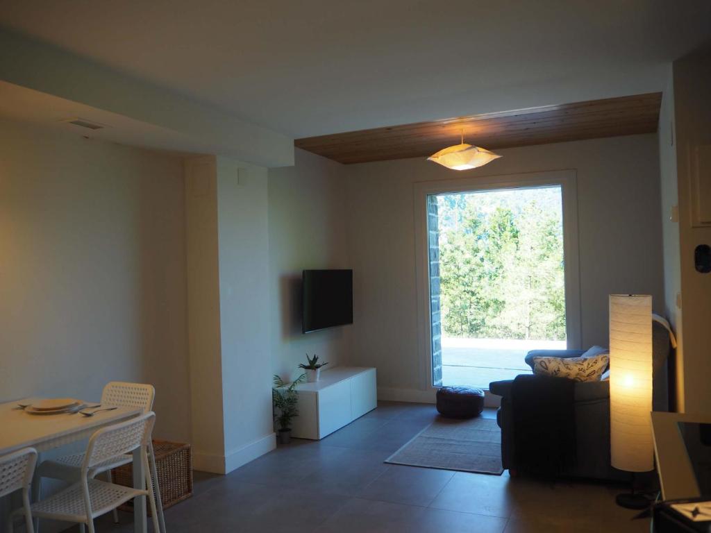 TV a/nebo společenská místnost v ubytování Apartamento Atari