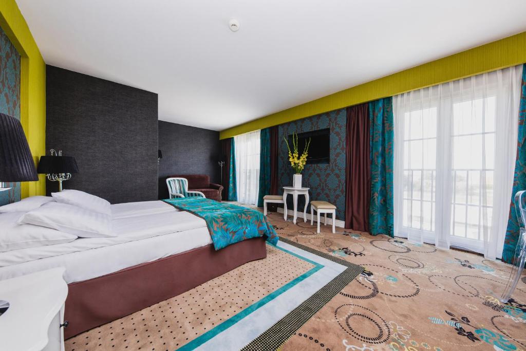 Postel nebo postele na pokoji v ubytování Hotel Lamberton
