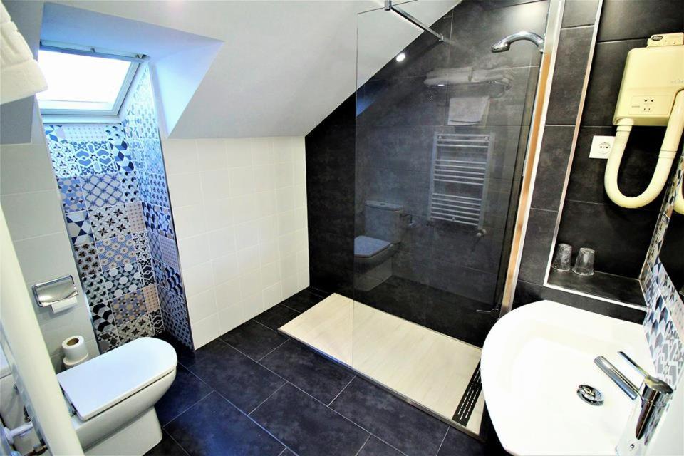 Koupelna v ubytování Hotel Alda A Boira
